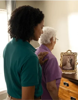 Caregiver with senior indoors